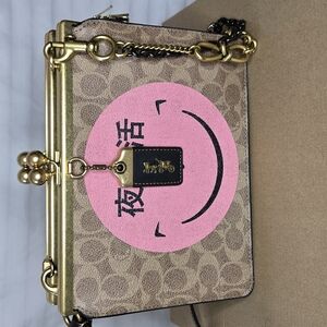 Coach Double Frame Bag In Signature Canvas With Rexy By Yeti Out